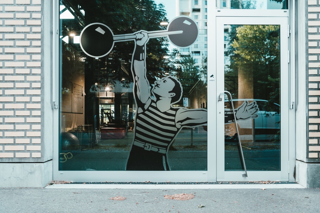 gym entrance with a sticker on the window