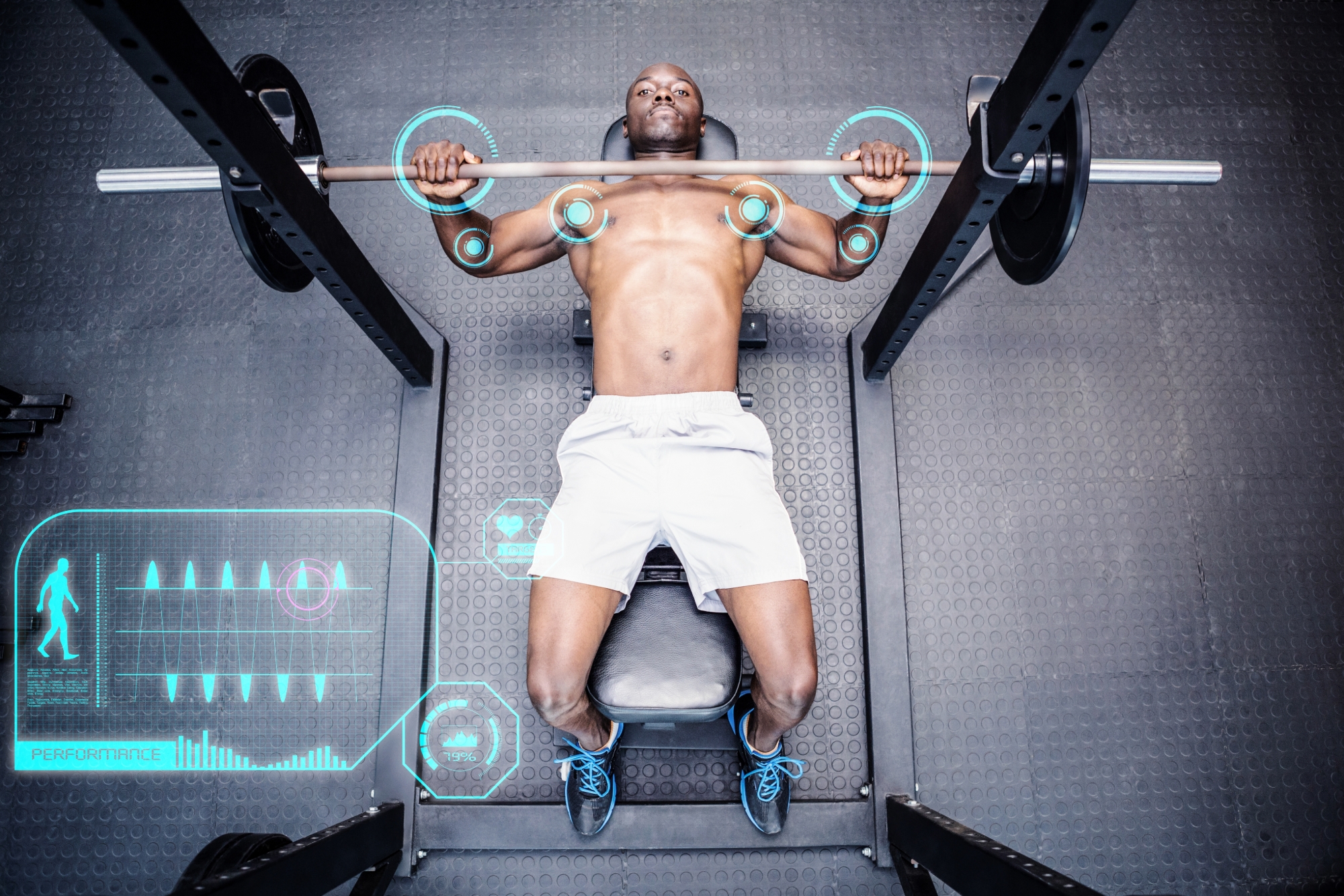 man on a weightlifting bench with a digital interface 
