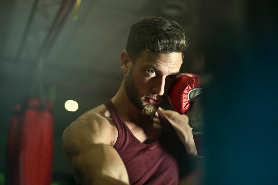 close-up of man wearing boxing gloves