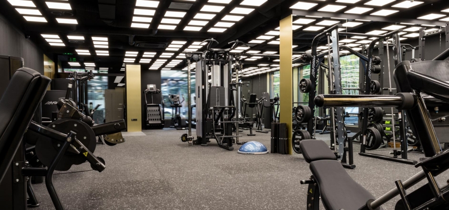 gym interior full of fitness equipment 