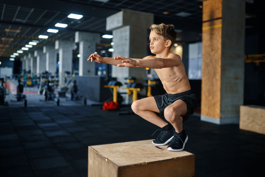 boy training at the gym