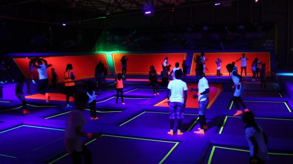 Perfect gym trampoline park design party with glow in the dark colors